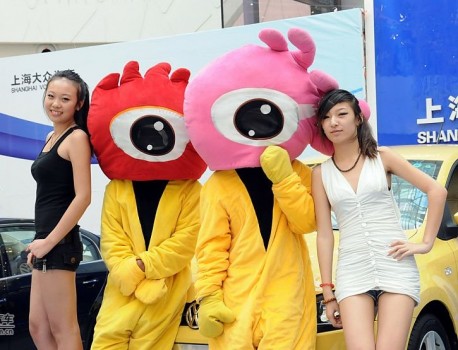 Two Chines Girls and a new Volkswagen Polo