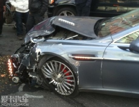 Aston Martin Rapide hits Audi Q5