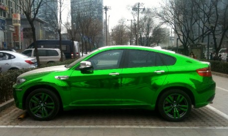 BMW X6M in silver and lime-green
