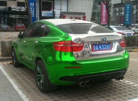 BMW X6M in silver and lime-green