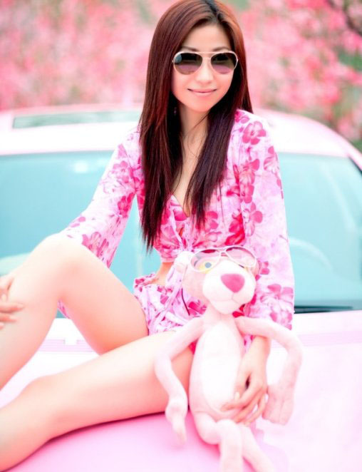 Pretty Chinese Girl with Long Legs checks out a BMW 6 