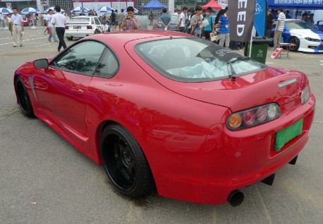 A very red & slightly pimped Toyota Supra in China
