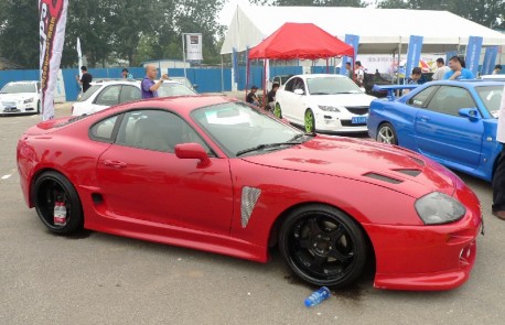 A very red & slightly pimped Toyota Supra in China