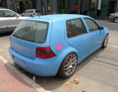 Volkswagen Golf in Blue and some Pink in China