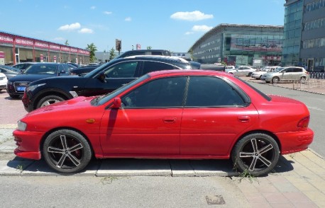 Spotted in China: rare GC8C Subaru Impreza WRX in Red