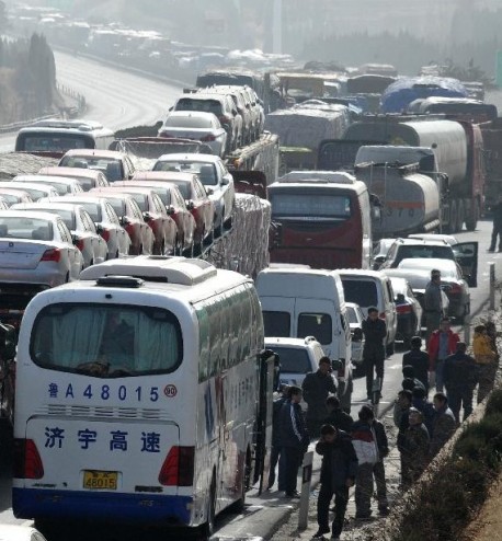 Sixteen cars on top of a Truck in China