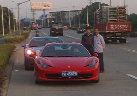 Another truck full of Ferrari supercars in China