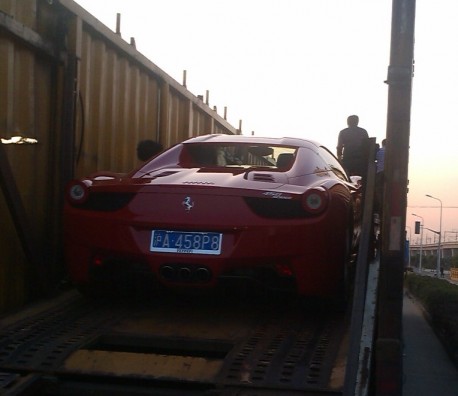 Another truck full of Ferrari supercars in China