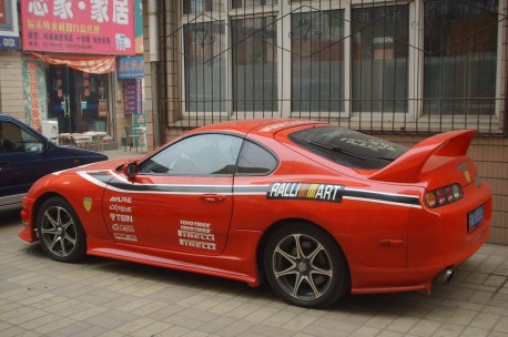 Toyota Supra is a red Marlboro Ferrari in China 