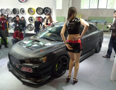 Two sweet girls & a Mitsubishi EVO X in China