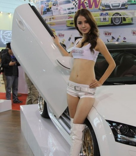 Two Pretty Chinese Girls and an Audi TT with Lambo-doors