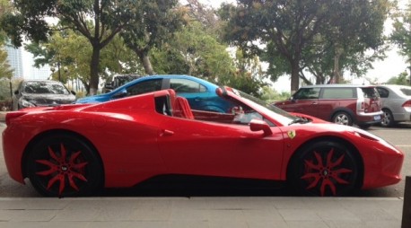 Ferrari 458 Spider is Red with a bit of Pink in China