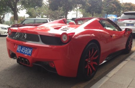 Ferrari 458 Spider is Red with a bit of Pink in China