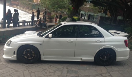 Subaru Impreza WRX STi is White with a body kit in China