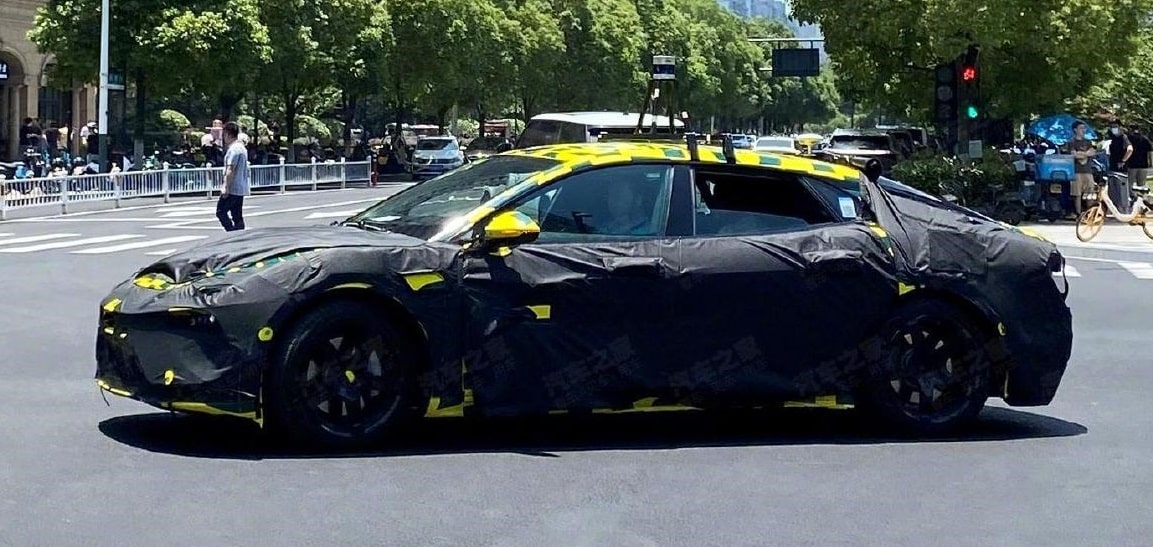 Lotus Envya (Type 133) spied in heavy camo on the streets of China