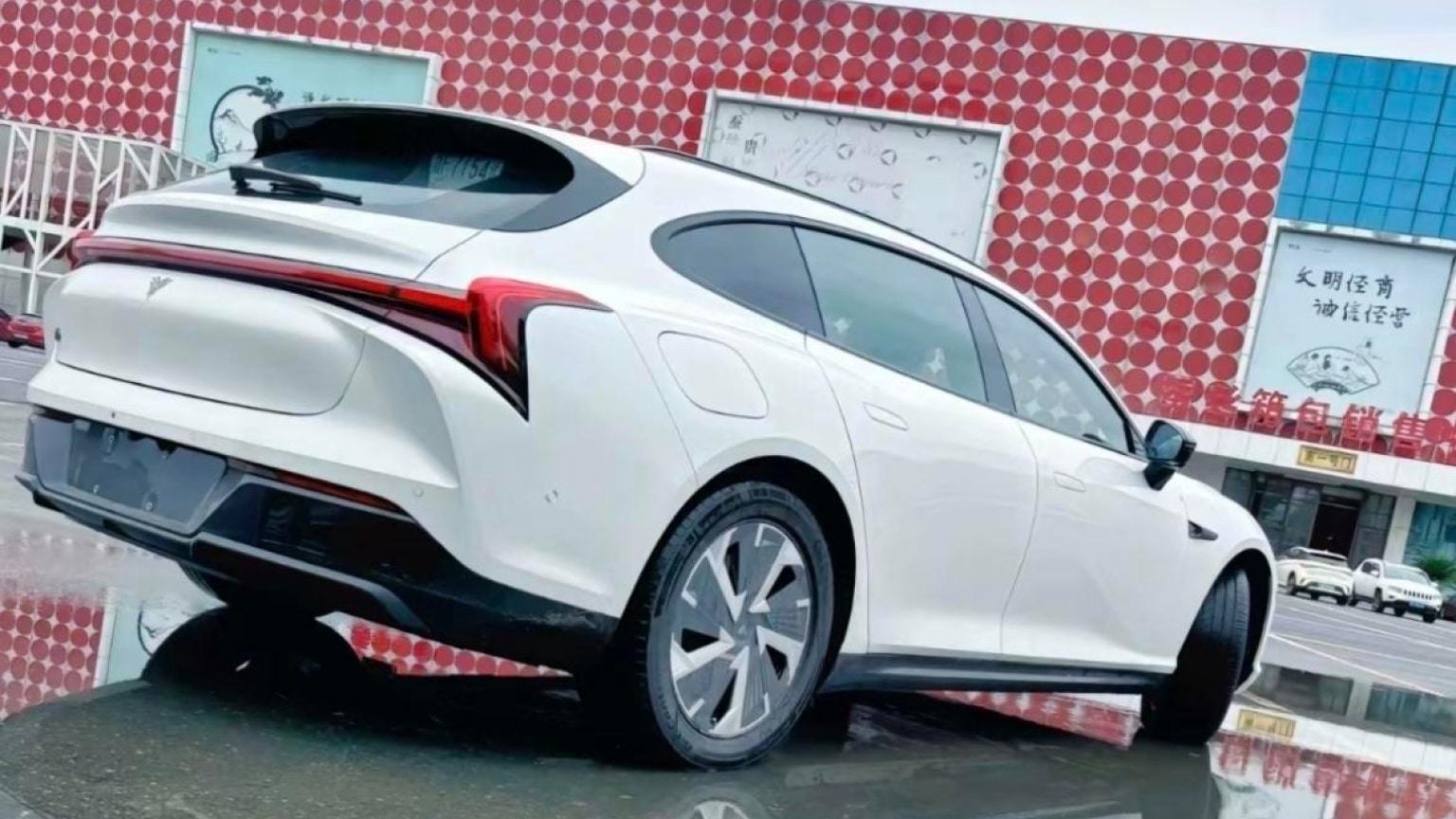 Neta S station wagon fully exposed as it enters China in August